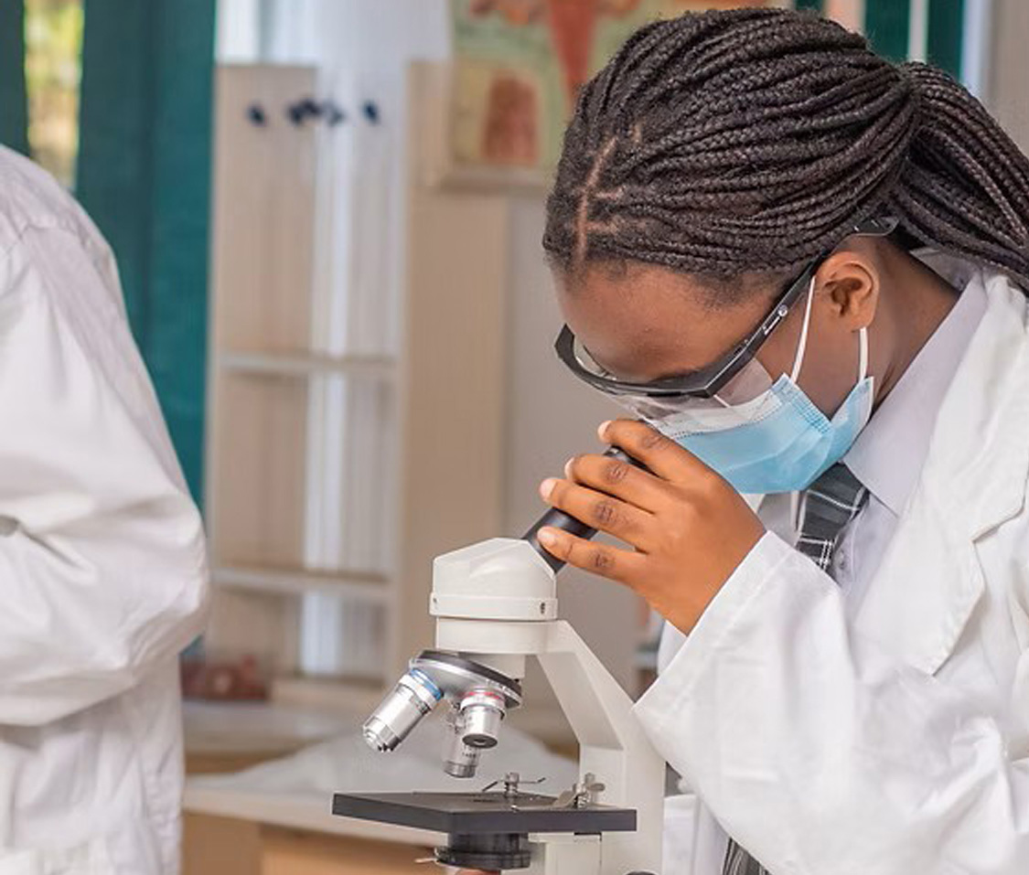 St. Patrick's student conducting a science experiment in the lab